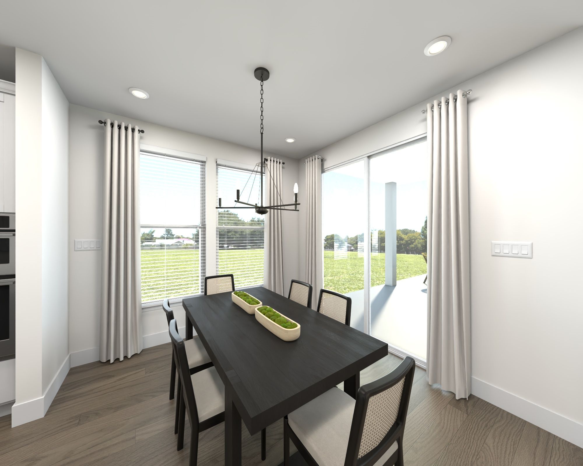 Dining Room:The open-concept floorplan allows for an easy flow between the kitchen and dining areas.