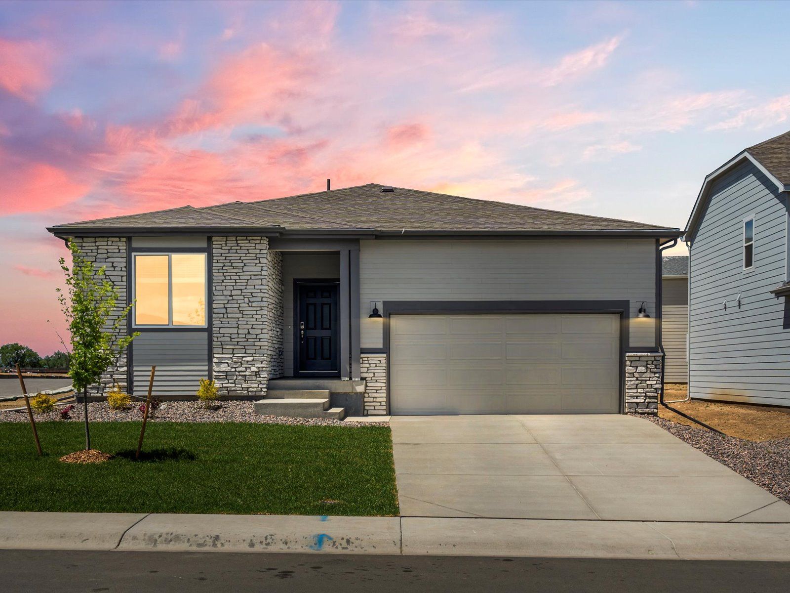 Exterior:The Blue Mesa floorplan image taken at a Meritage Homes community in Windsor, CO.