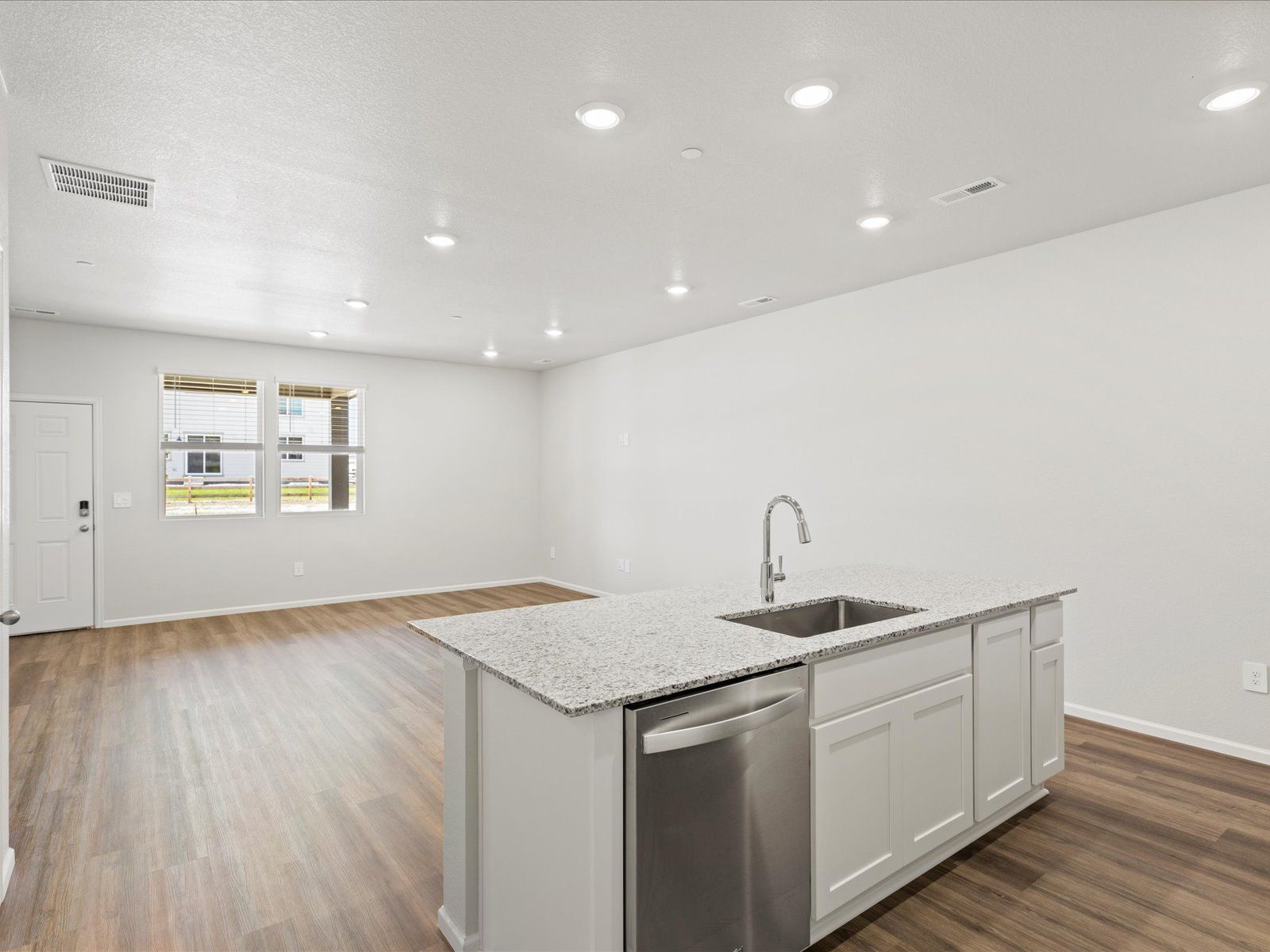 Kitchen Island:The Orchard floorplan image taken at a Meritage homes community in Windsor, CO