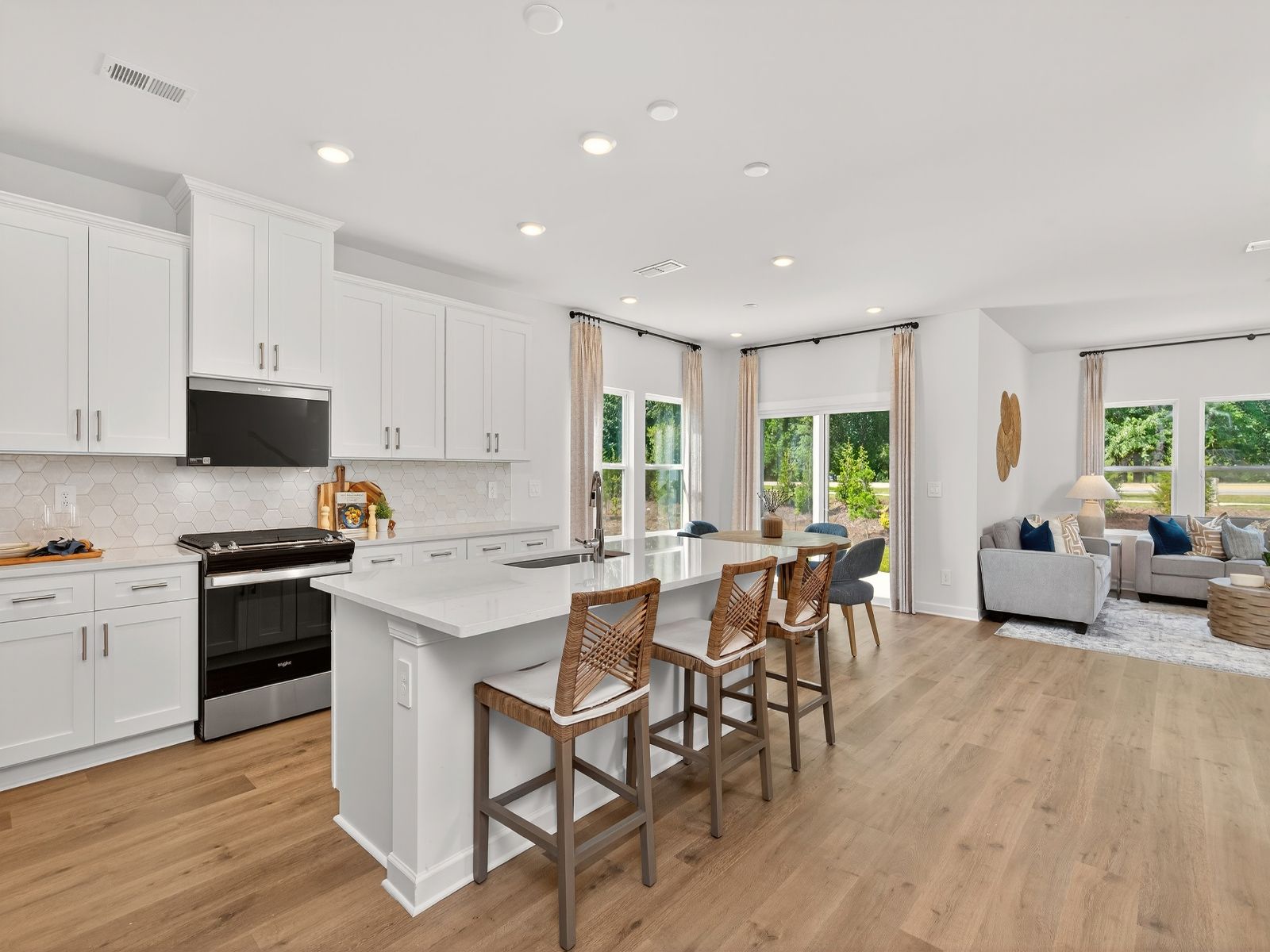 Kitchen:The oversized kitchen island can easily be used as a bar counter for extra seating.