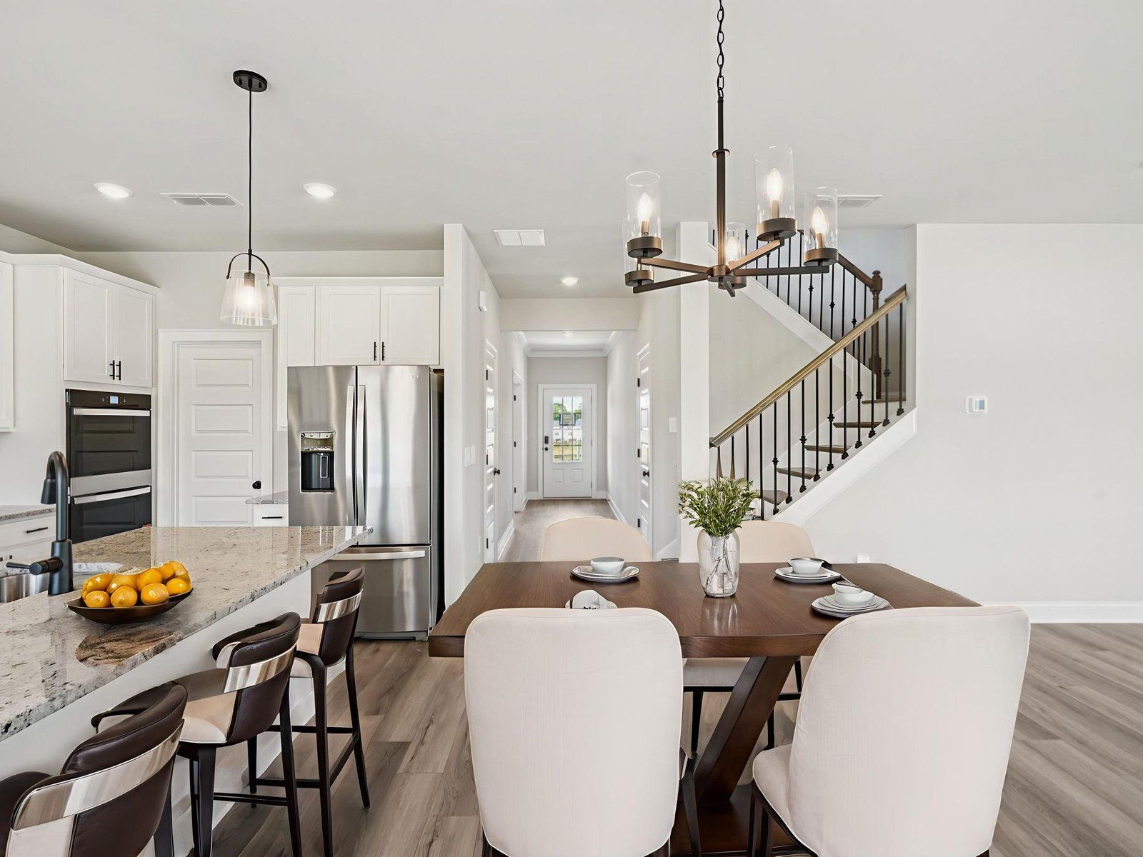 The Dakota floorplan with the Elemental White interior package.:Great Room