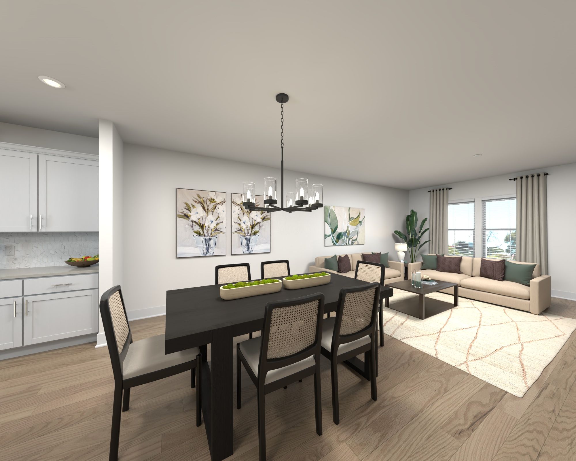 Dining Room:The open-concept floorplan allows for an easy flow between the kitchen and dining areas.