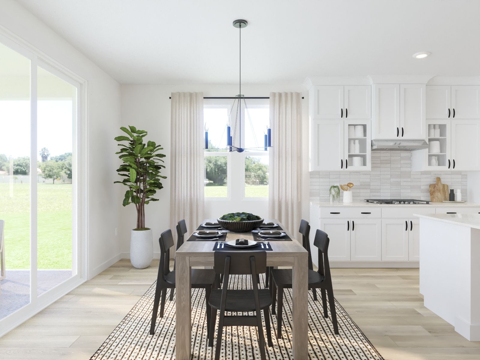 Dining Room:The open-concept floorplan allows for an easy flow between the kitchen and dining areas.