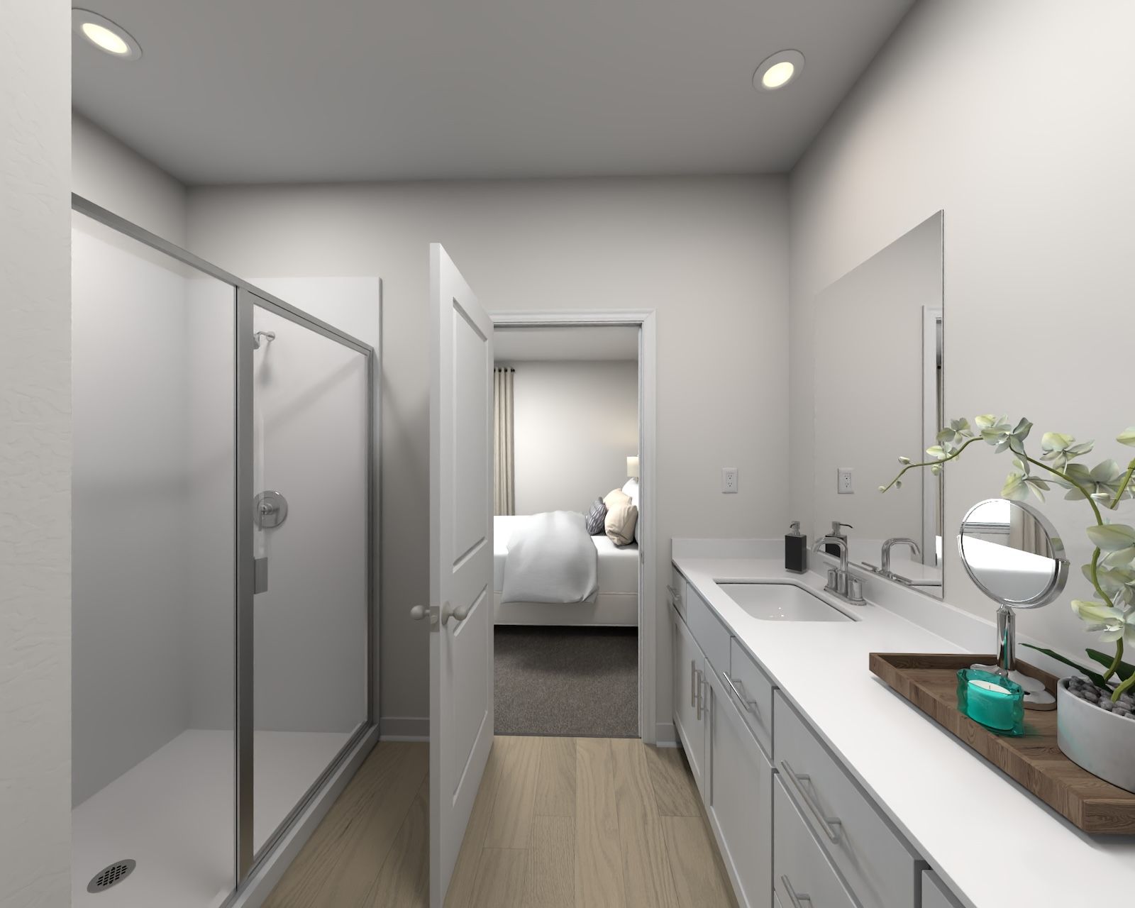 Primary Suite:The primary bathroom offers dual vanity sinks and a walk-in shower.