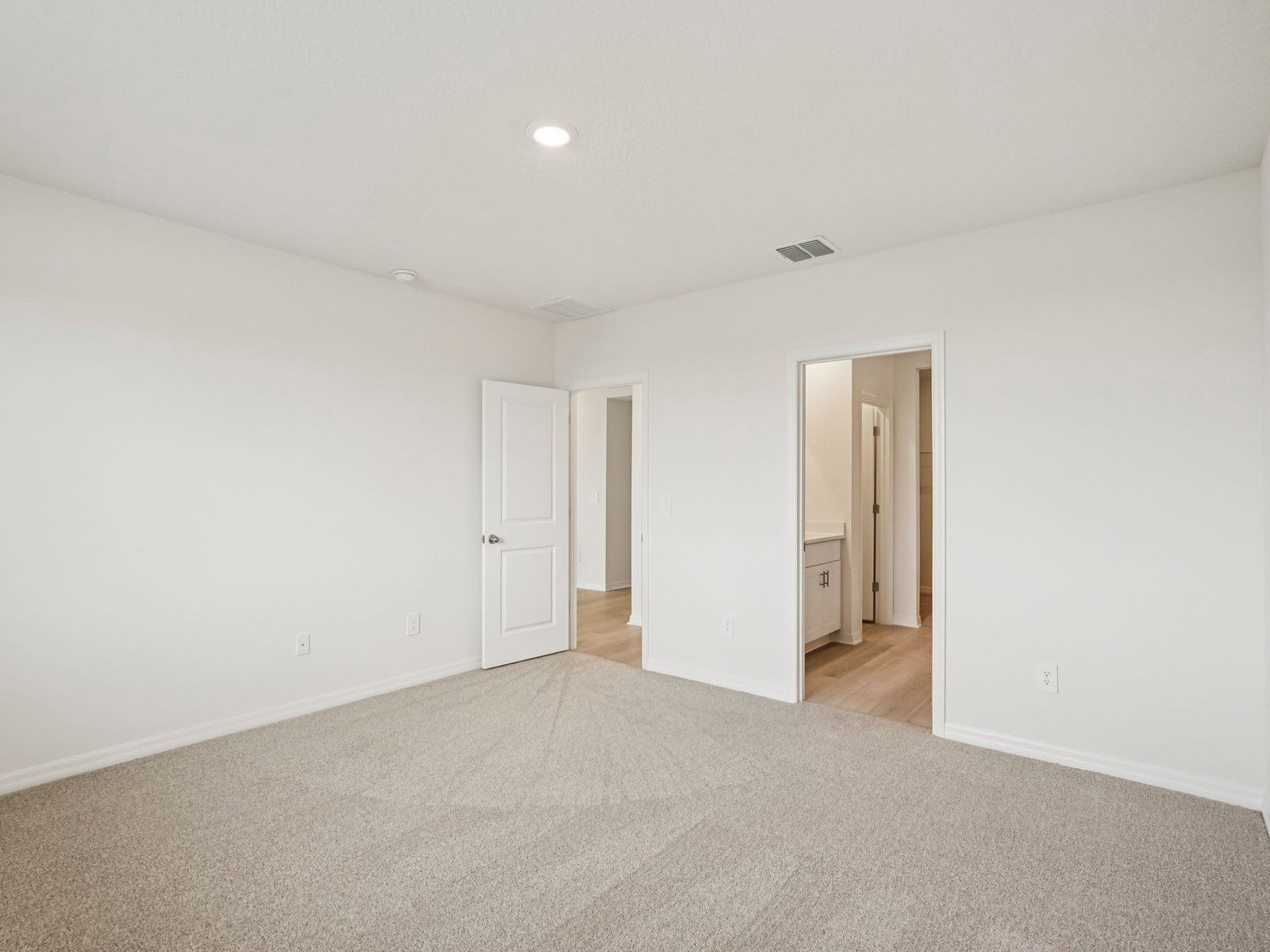 The Primary Bedroom of the Foxglove at 7711 Gilchrist Springs Dr.:23-custom-Tampa - Salt Meadows by Meritage Homes - 7711 Gilchrist Spgs Dr Parrish FL 34219 - 023.jpg