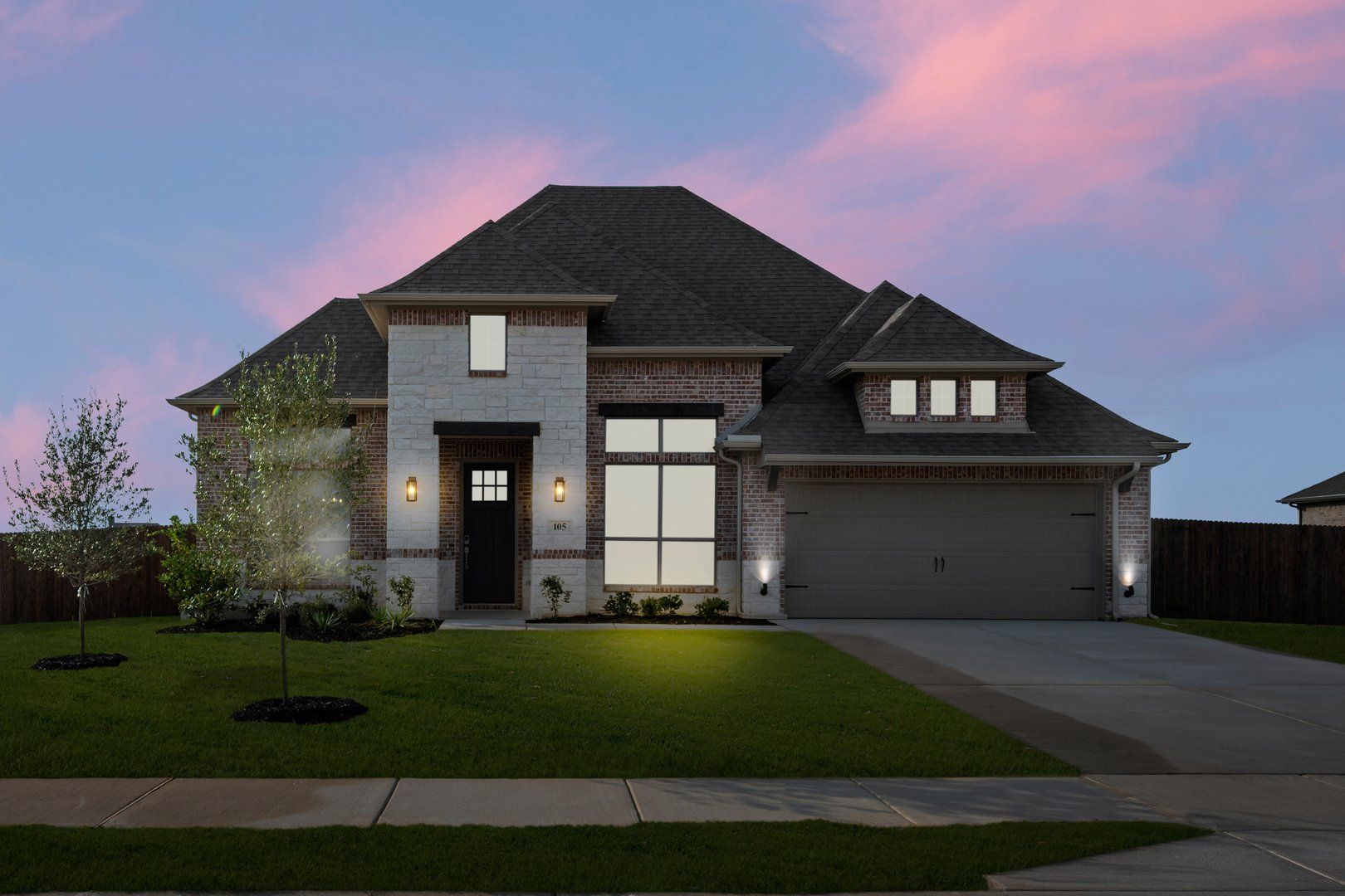 Coyote Crossing-Concept 2622-105 Grey Wolf Court-Front Twilight1-Risewell Homes