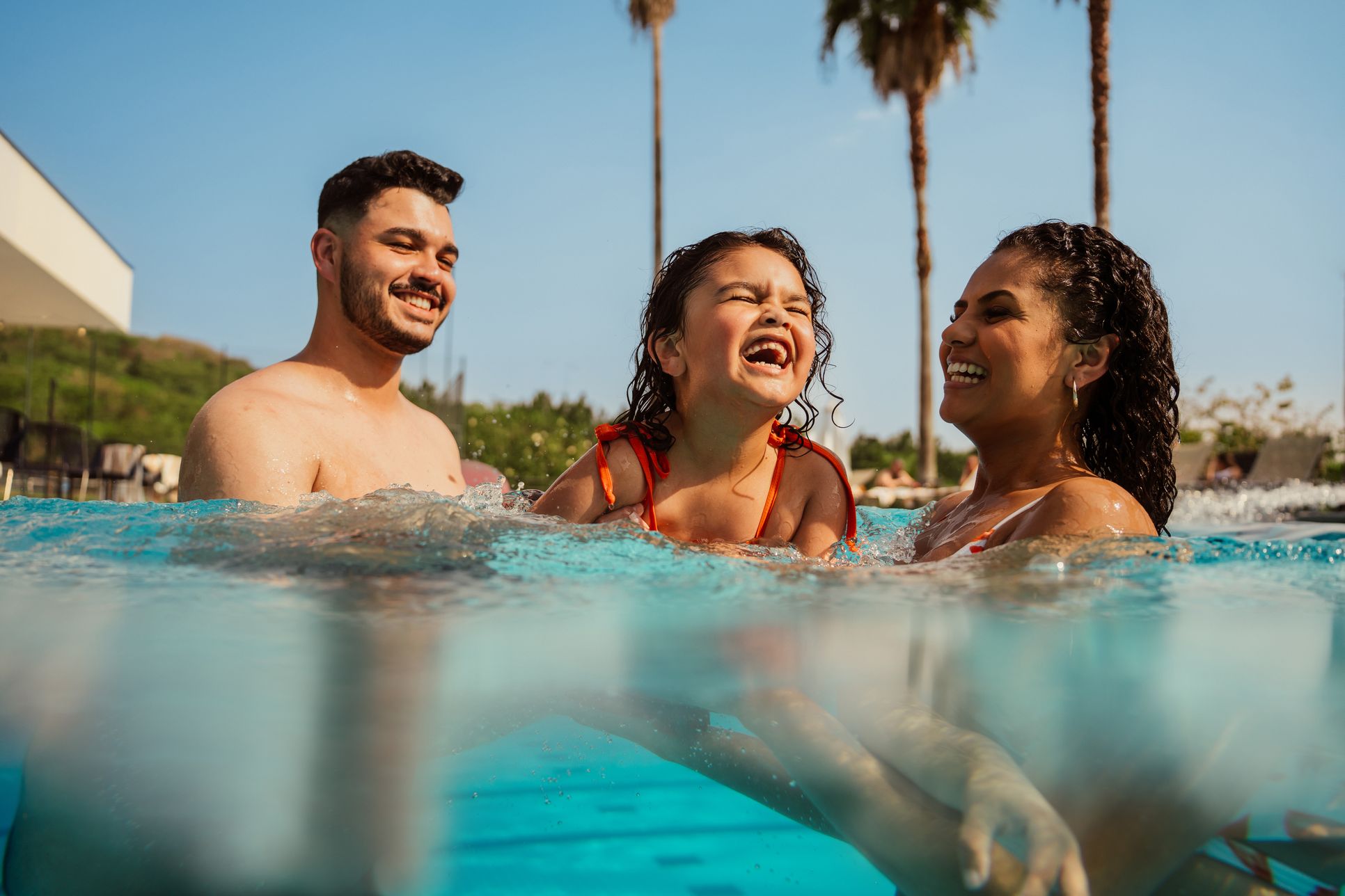 Kentucky Square - Lifestyle Photography - Family in Pool - Risewell Homes