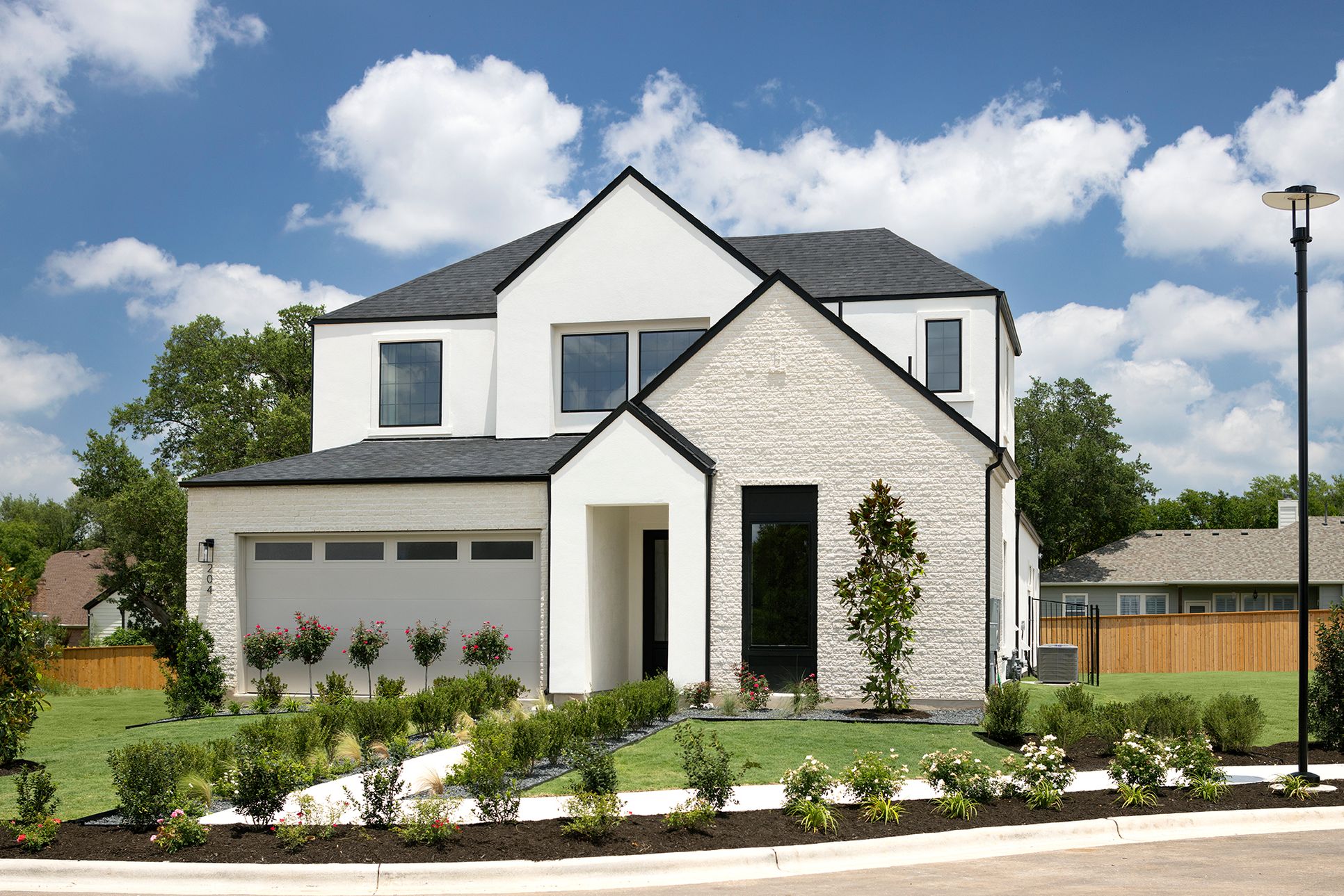 Manors at Bluff Haven - Plan 4063 - Front Exterior - Official Model Photography - Risewell Homes