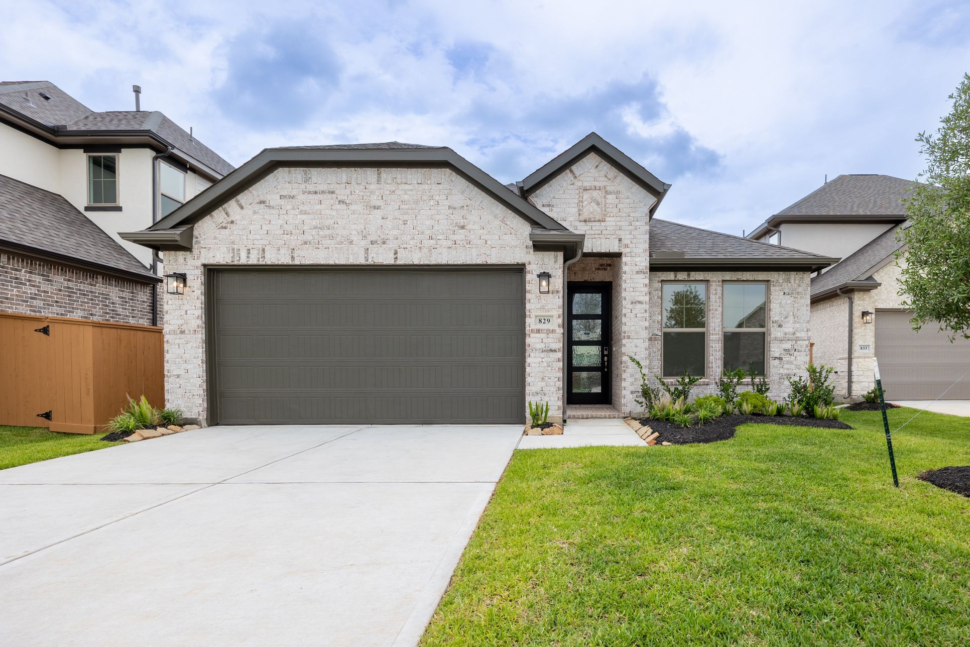 Sunterra - Homesite 102 - Front Exterior - Homesite Photography