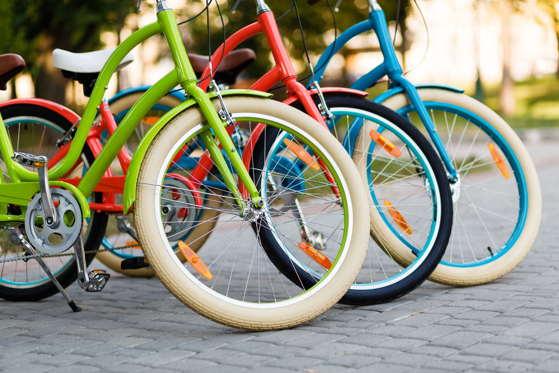 Three beautiful lady city bikes.