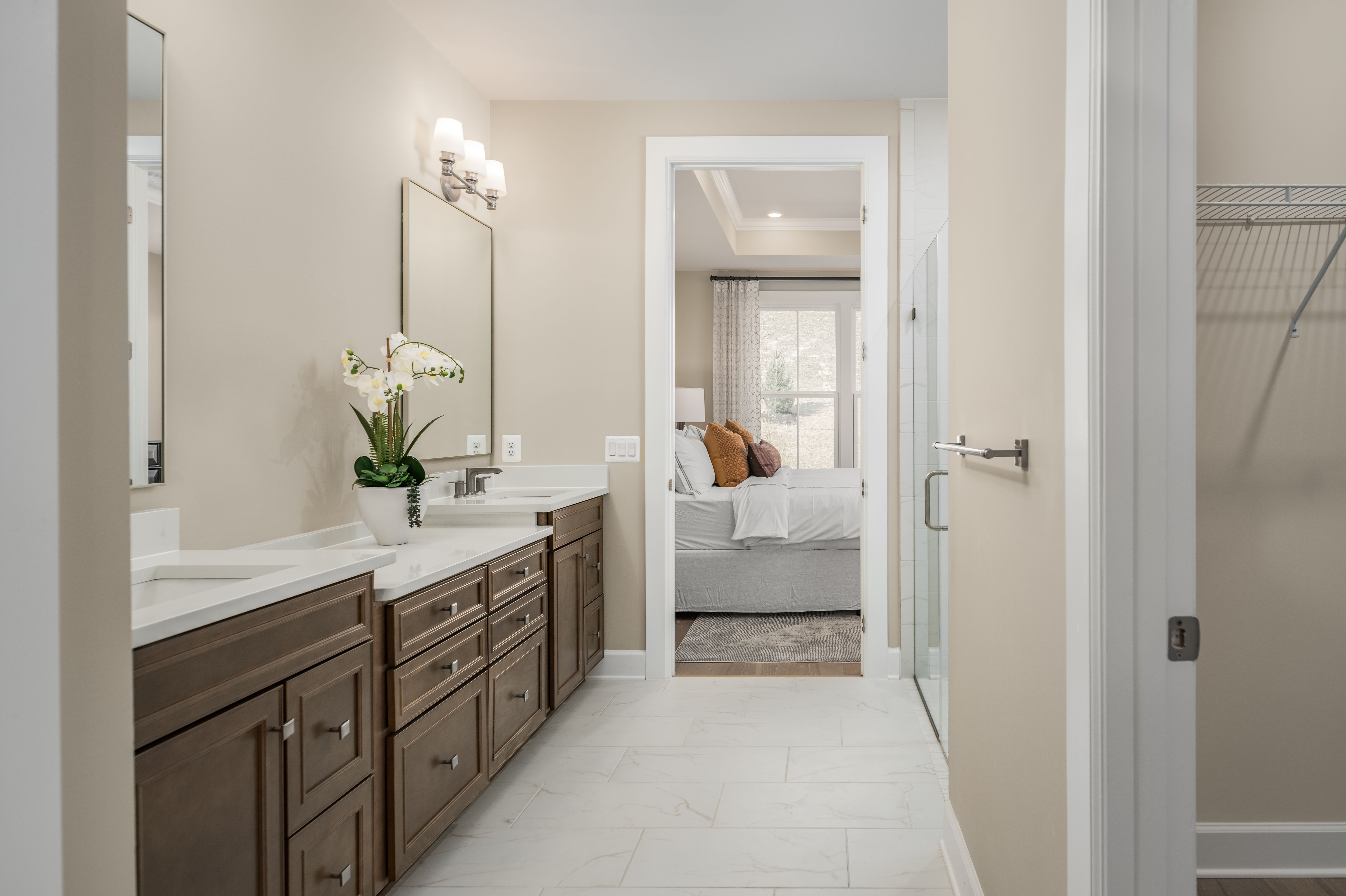 Every Detail Has Been Carefully Curated for Your Comfort:NVHomes includes designer tile, raised height vanities, decorative lighting, zero entry showers, rocker switches, grab bars, and medicine cabinets for your convenience.