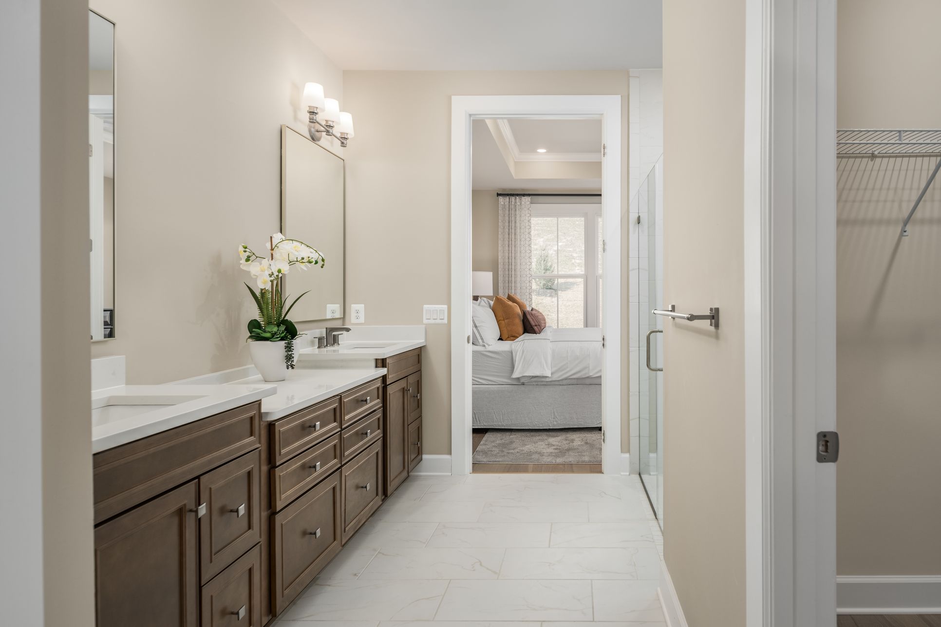 Every Detail Has Been Carefully Curated for Your Comfort:NVHomes includes designer tile, raised height vanities, decorative lighting, zero entry showers, rocker switches, grab bars, and medicine cabinets for your convenience.