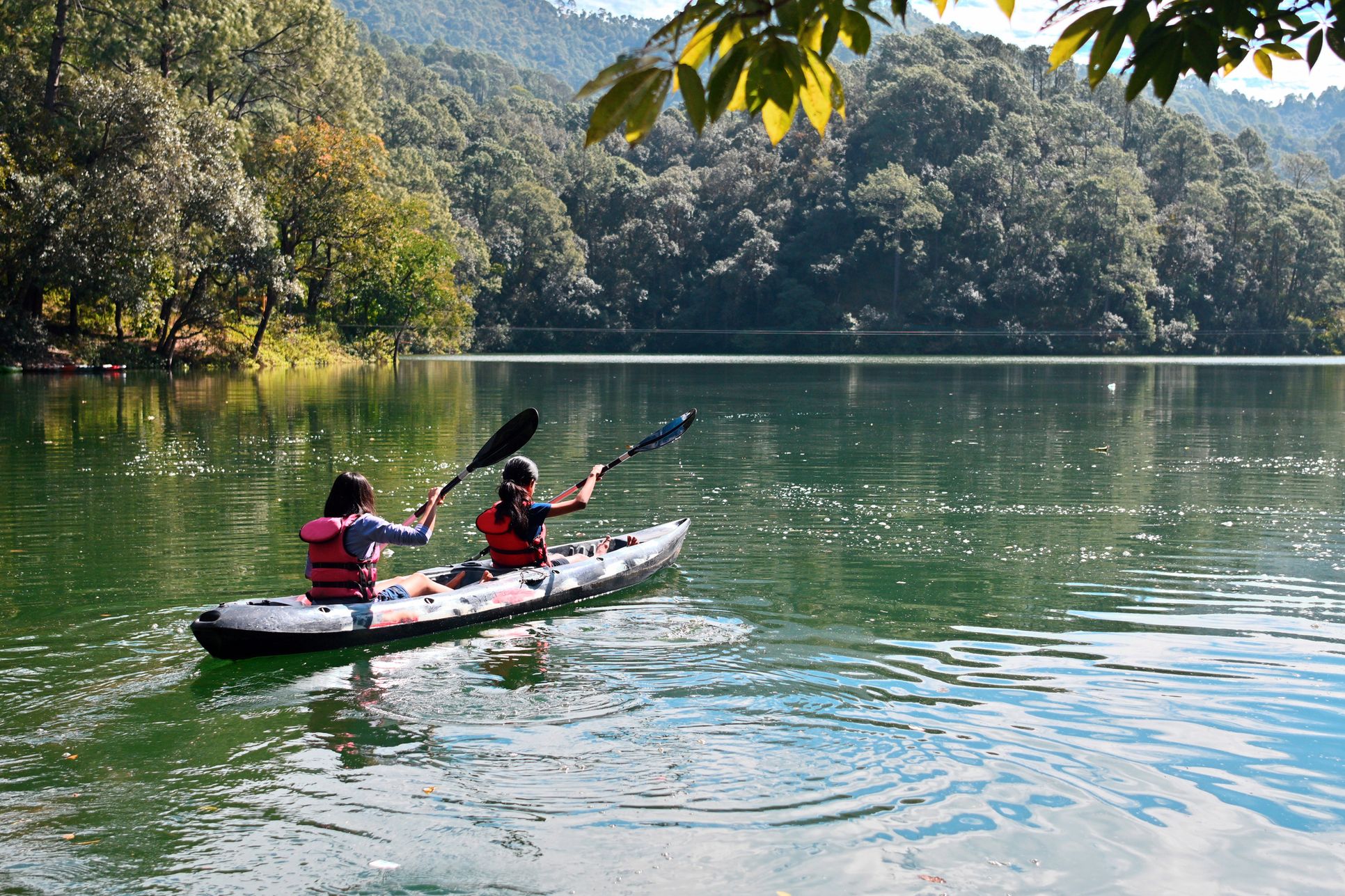 Experience a peaceful lake lifestyle, featuring kayaking, paddleboarding, fishing, and boating.
