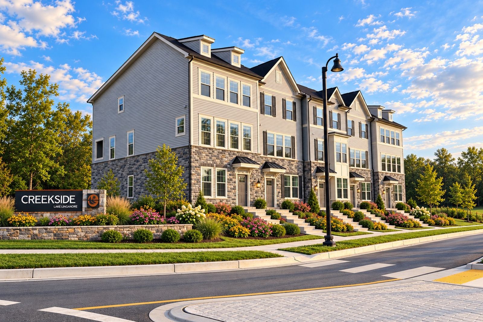 Now selling grand townhomes with two-car garages.