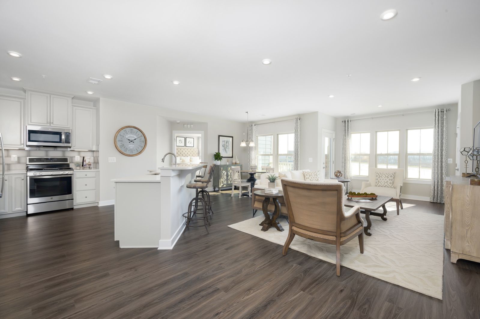 OUR HOMES ARE DESIGNED TO MAKE YOUR LIFE EASIER:The combined kitchen and living area is sure to quickly become a favorite destination in your home, with easy access to both the fridge and the couch. Click here to see what our homeowners have to say