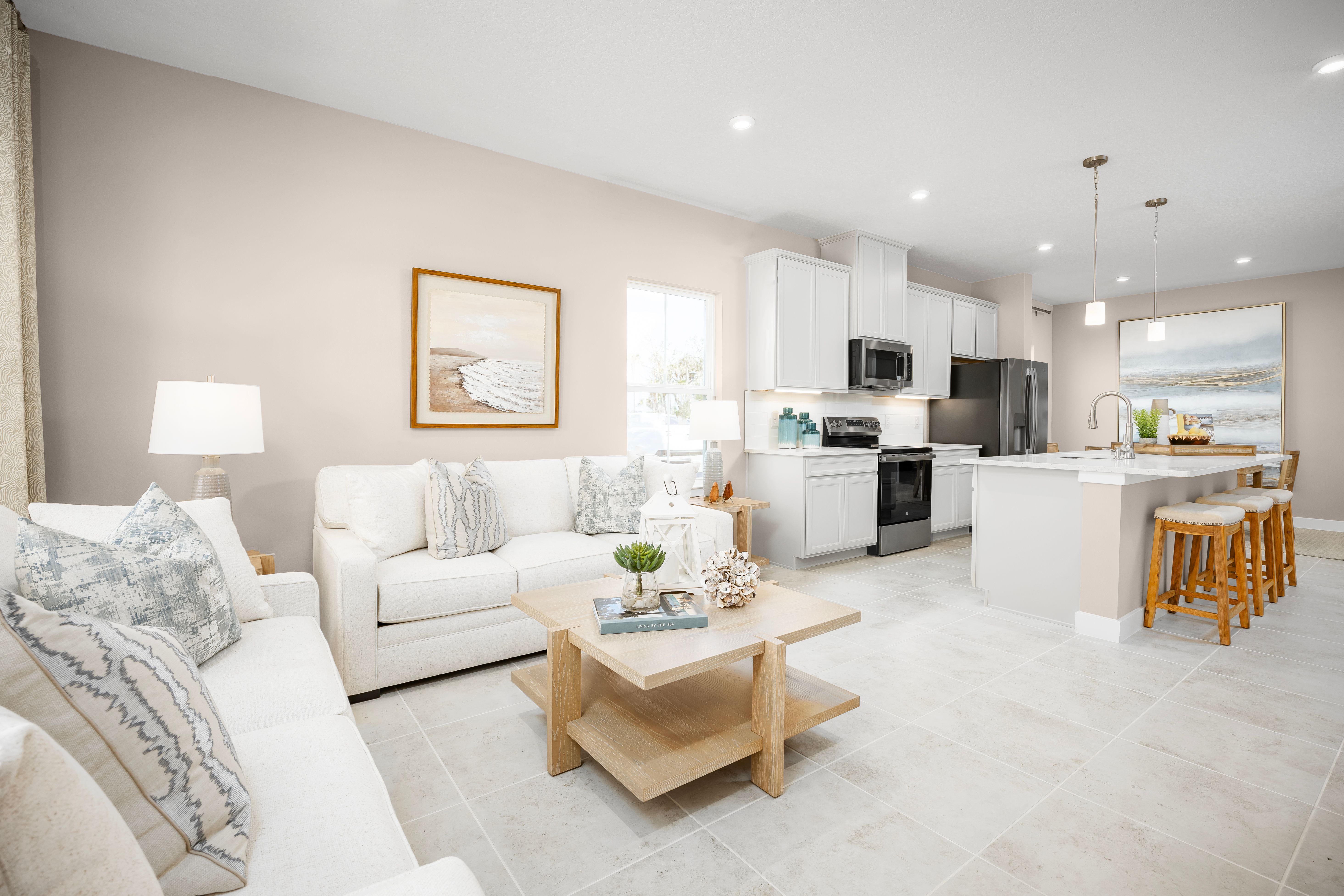 Townhomes in the Lakes District with lake views, classic exteriors, and spacious 2-car garages.:Join the list to learn more.