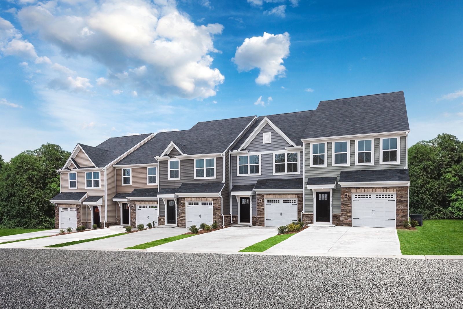 Stop renting and start owning a new modern townhome with a garage at WestStone!