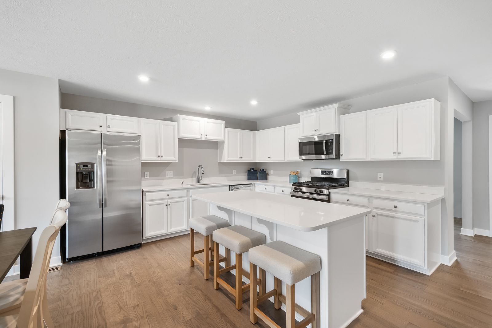 Quick move-in and ready-to-build low maintenance ranch homes in Whiteland!:Live a maintenance free lifestyle with provided lawn care & snow removal in an active community in charming Whiteland! Click here to schedule a phone call, virtual or model tour.
