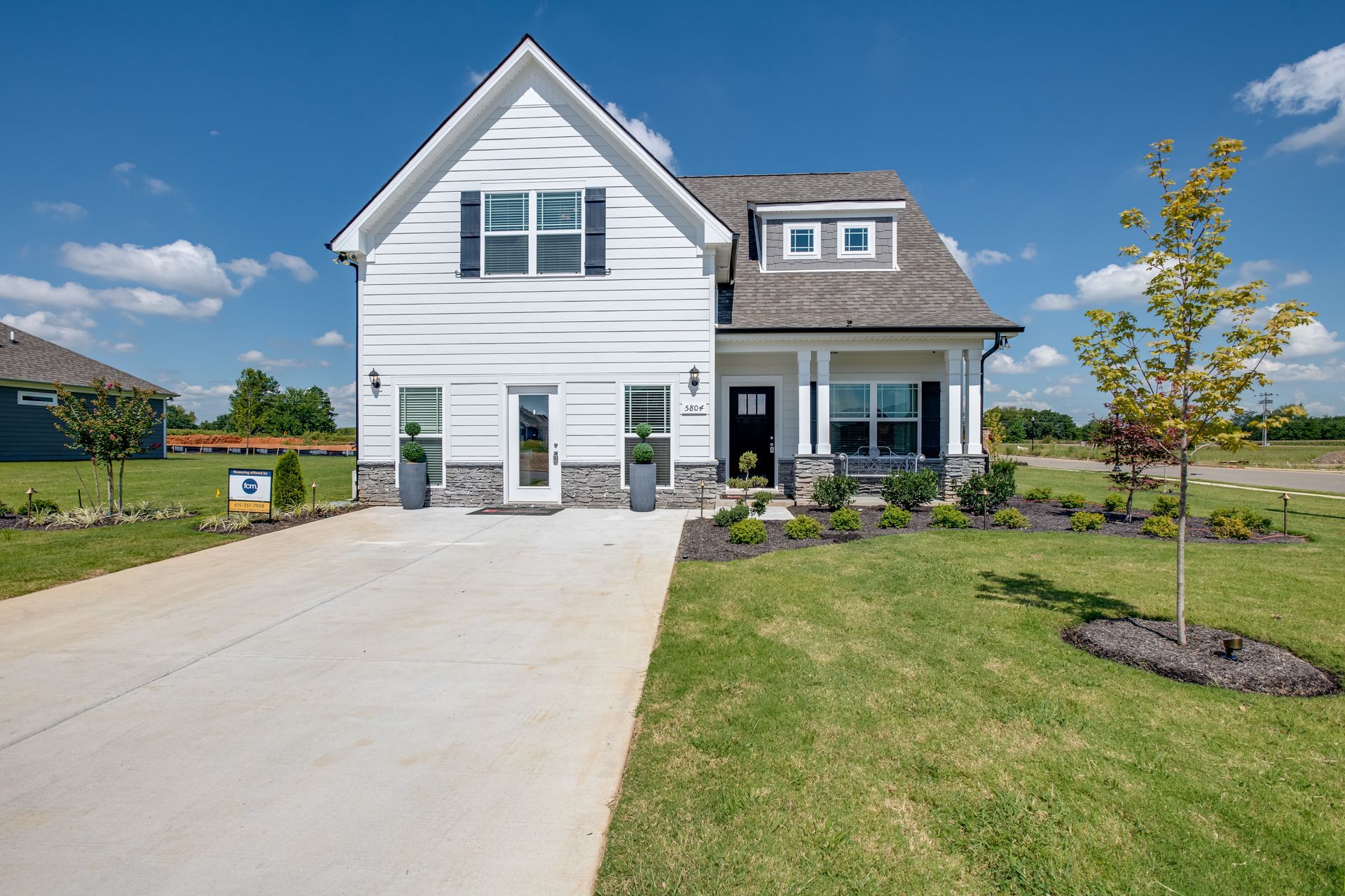 Model home exterior featuring a 1989 floor plan:1989 Elevation- Salem Landing Model Home