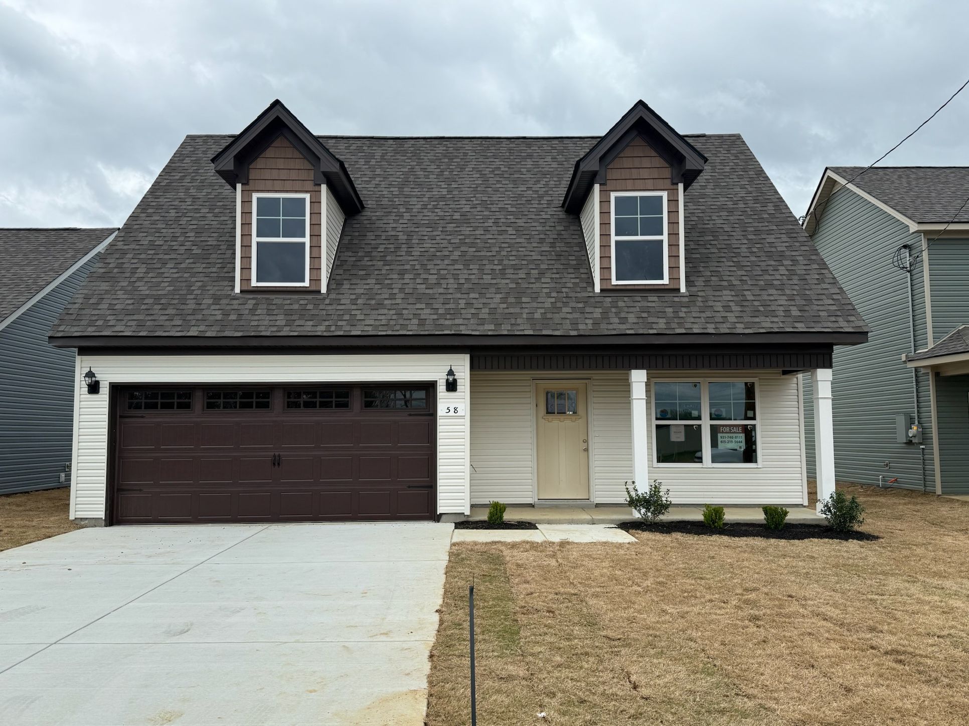 Exterior:A cottage home with a front porch is so cozy & inviting. You can your new market home today with a