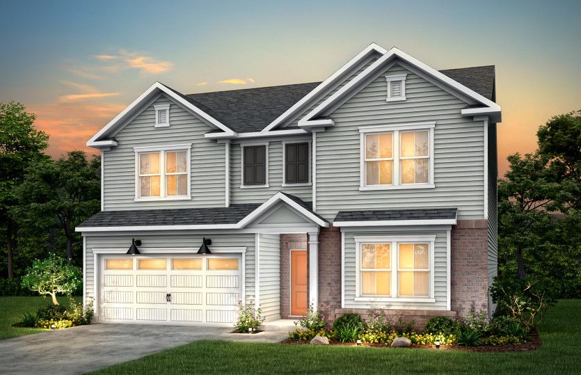 Mitchell:Mitchell Exterior LC2M features siding, brick, covered front door and 2 car garage