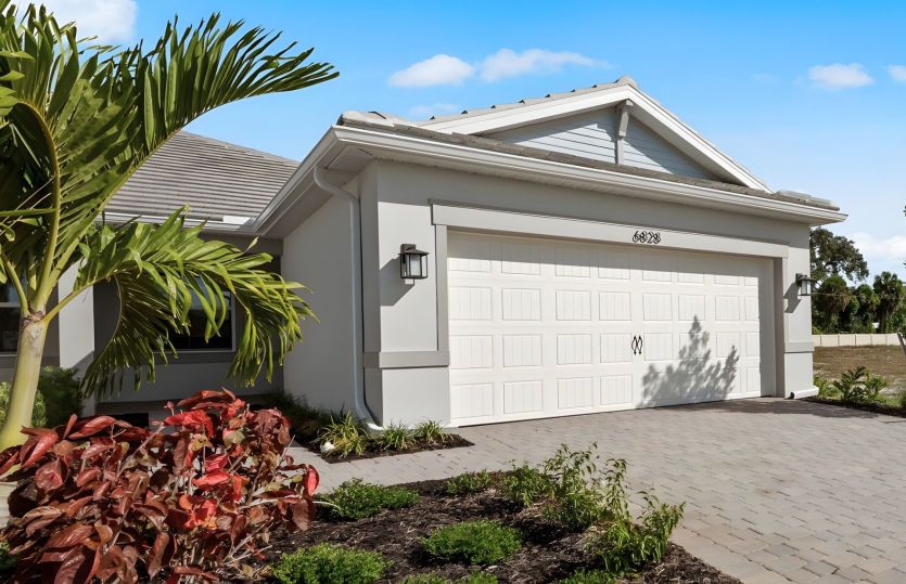 Exterior:Welcoming Ellenwood Exterior with Impact Glass Windows