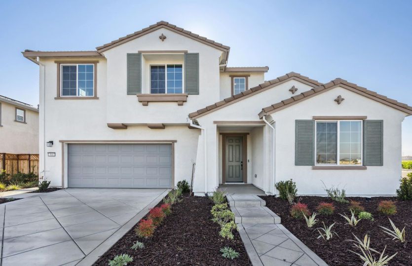 Exterior:Plan 2 with professionally landscaped front yard