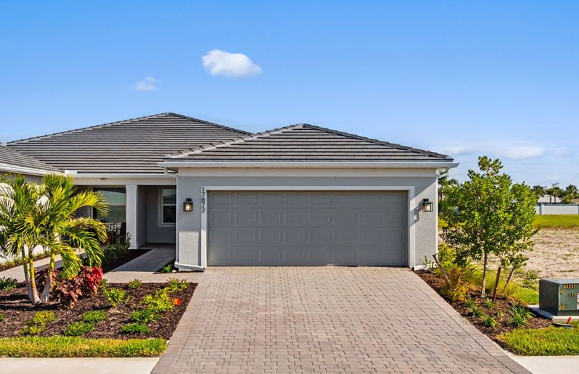 Exterior:Welcoming Ellenwood Exterior with Impact Glass
