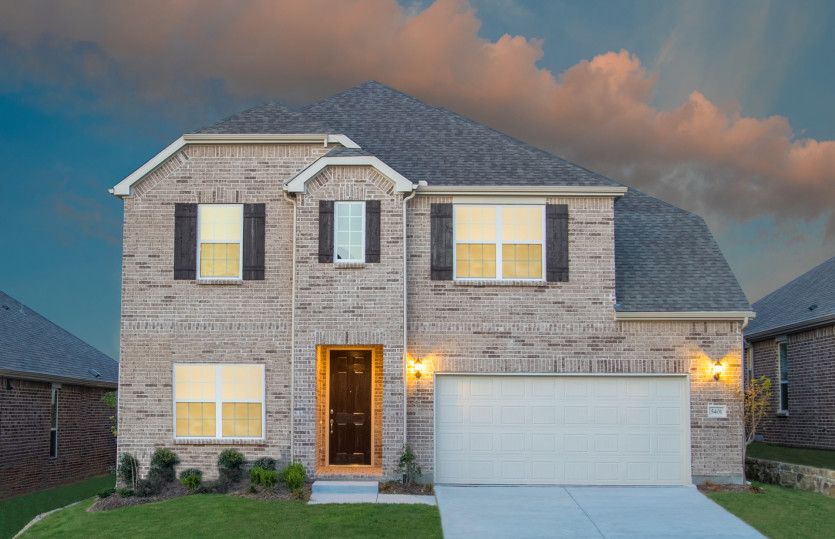 Lexington:Exterior B with wood shutters and a 2-car garage with additional storage
