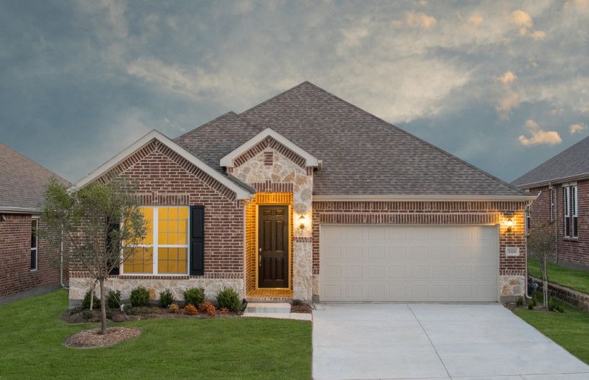 Dayton:The Dayton, a one-story home with 2-car garage, shown with Home Exterior B