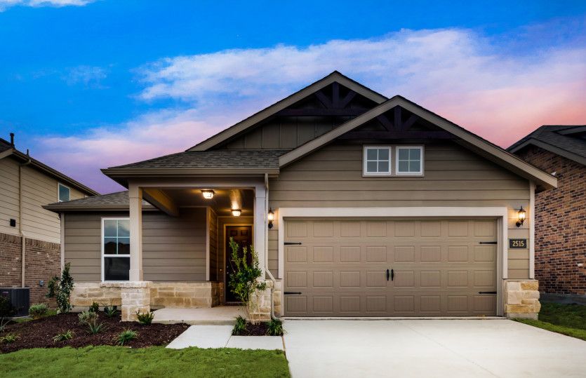 Emory:The Emory, a one-story home with 2-car garage, shown with Home Exterior 40