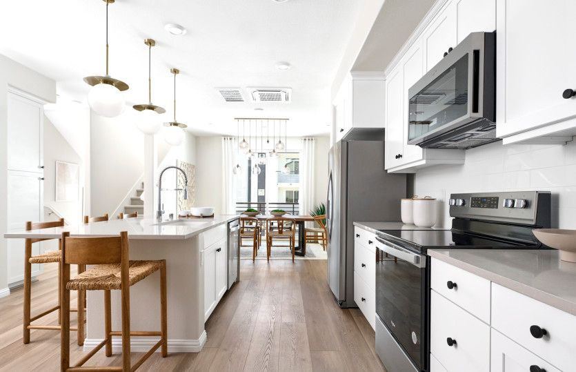 Exterior:Sunlit kitchen with plenty of storage