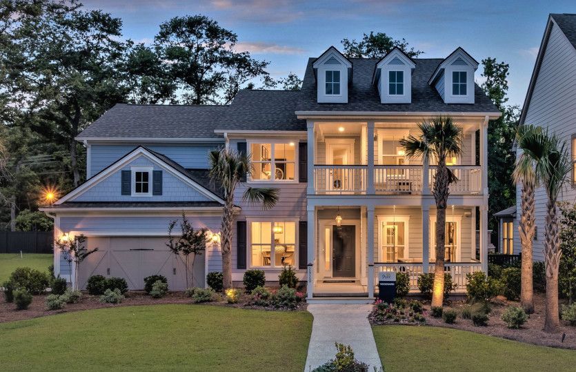 Exterior:Woodward Exterior 52 at Twilight with a double front porch