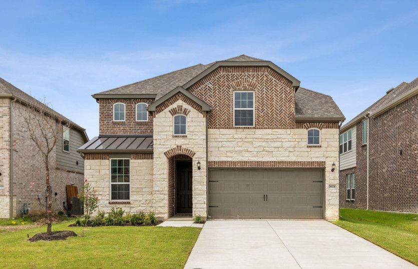 Riverdale:The Riverdale, a two-story home with 2-car garage, shown as Home Exterior I