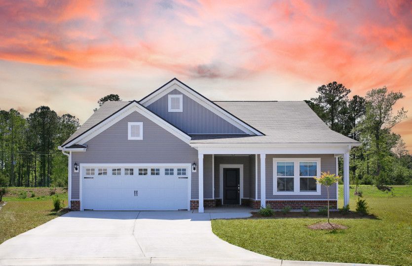 Bedrock:Bedrock New Home Exterior LC3G at Twilight with a covered porch