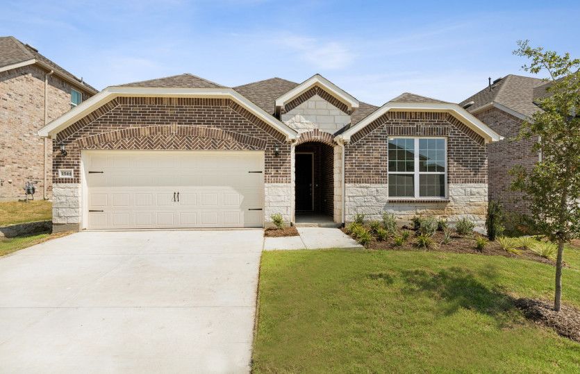 Mckinney:McKinney home design with stone, brick, and 2-car garage