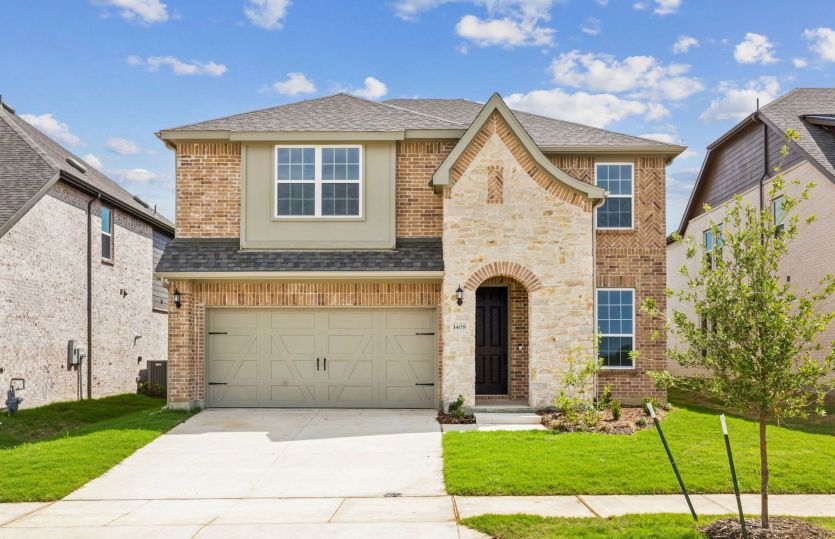 Hamilton:The Hamilton, a two-story home with 2-car garage, shown as Home Exterior B