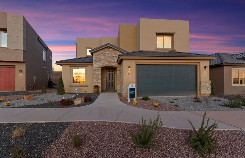Yucca:The Yucca model home at Colibri designed with stylish stone veneer accents.