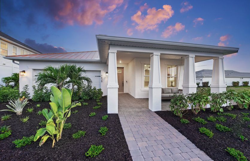 Coral:Welcoming exterior with front porch