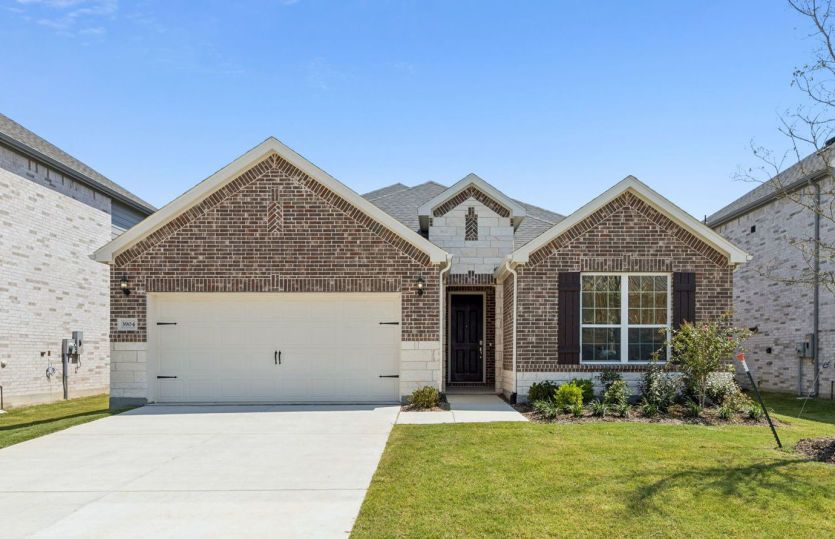 Exterior:The Mooreville, a two-story home available now for move-in