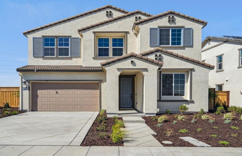 Exterior:Plan 1 home with draught tolerant landscaping