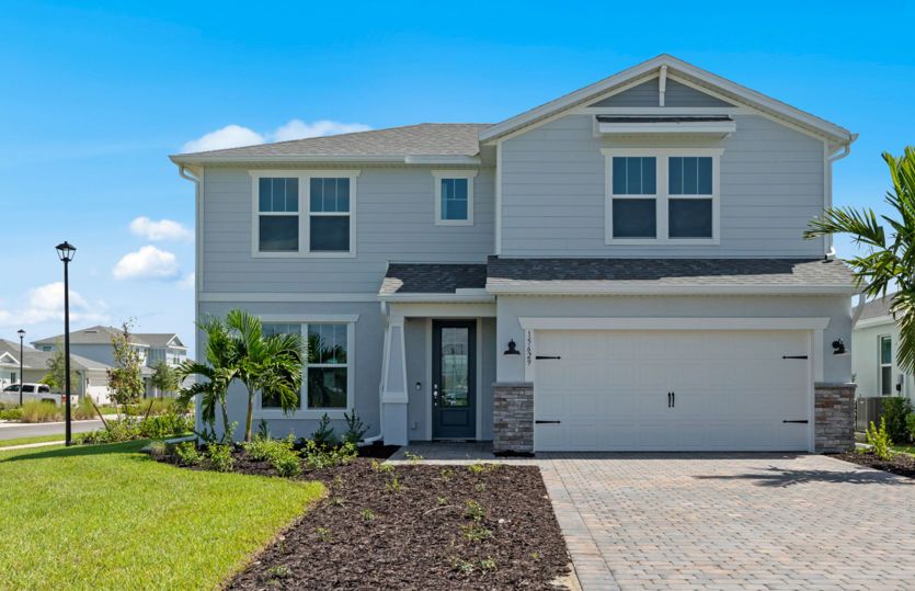 Exterior:Welcoming Whitestone Exterior with Impact Glass