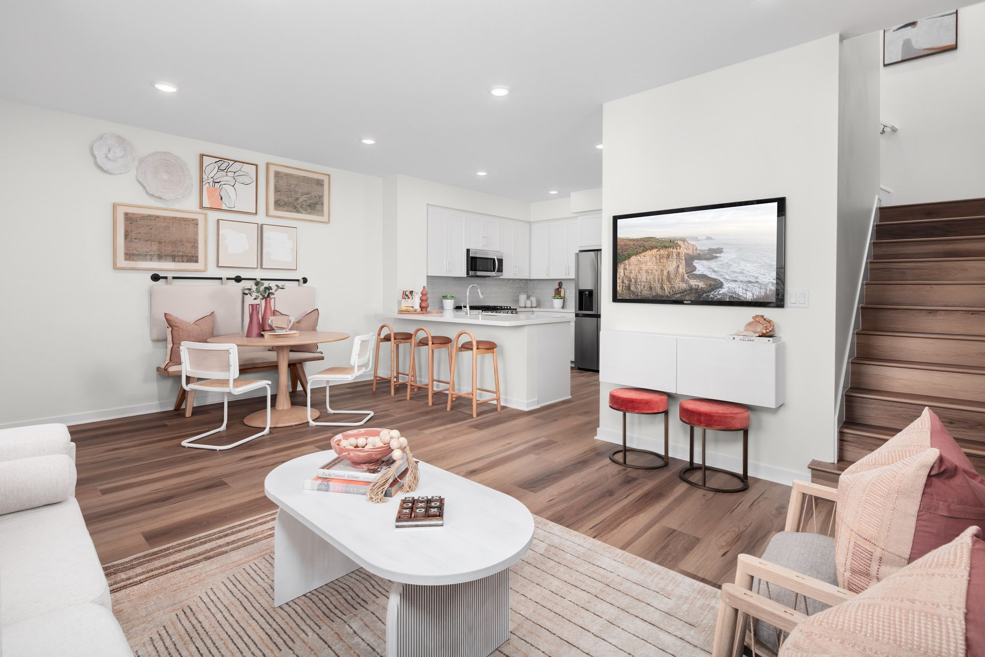 Plan 1 Model Home Great Room:Plan 1 Model Home expansive and connected living, dining, and kitchen area