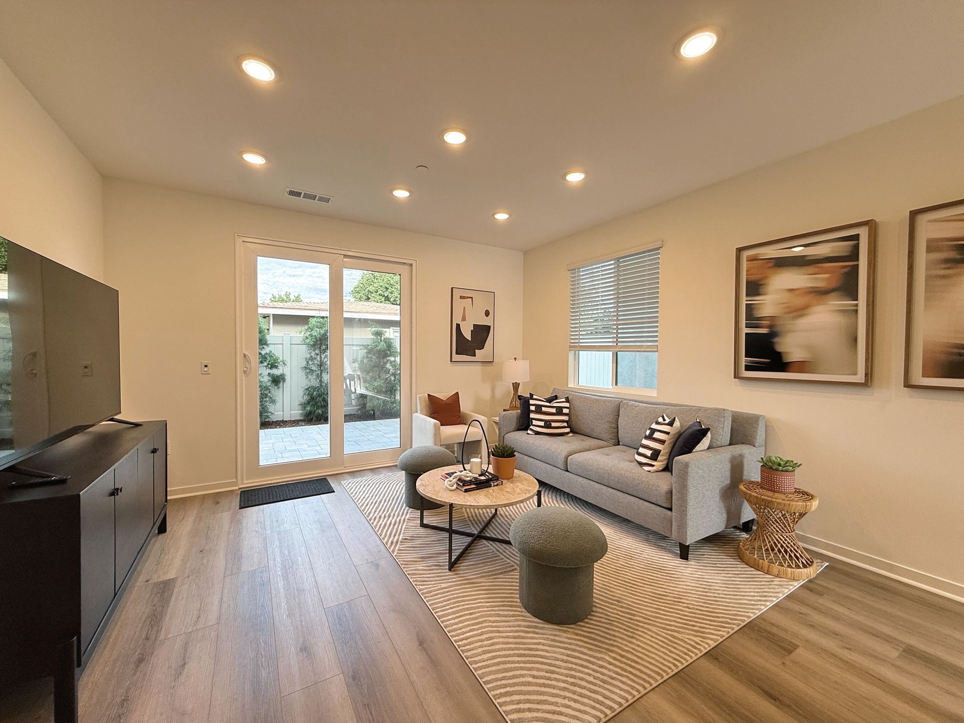 Living Area:Living area with sliding glass door patio entrance