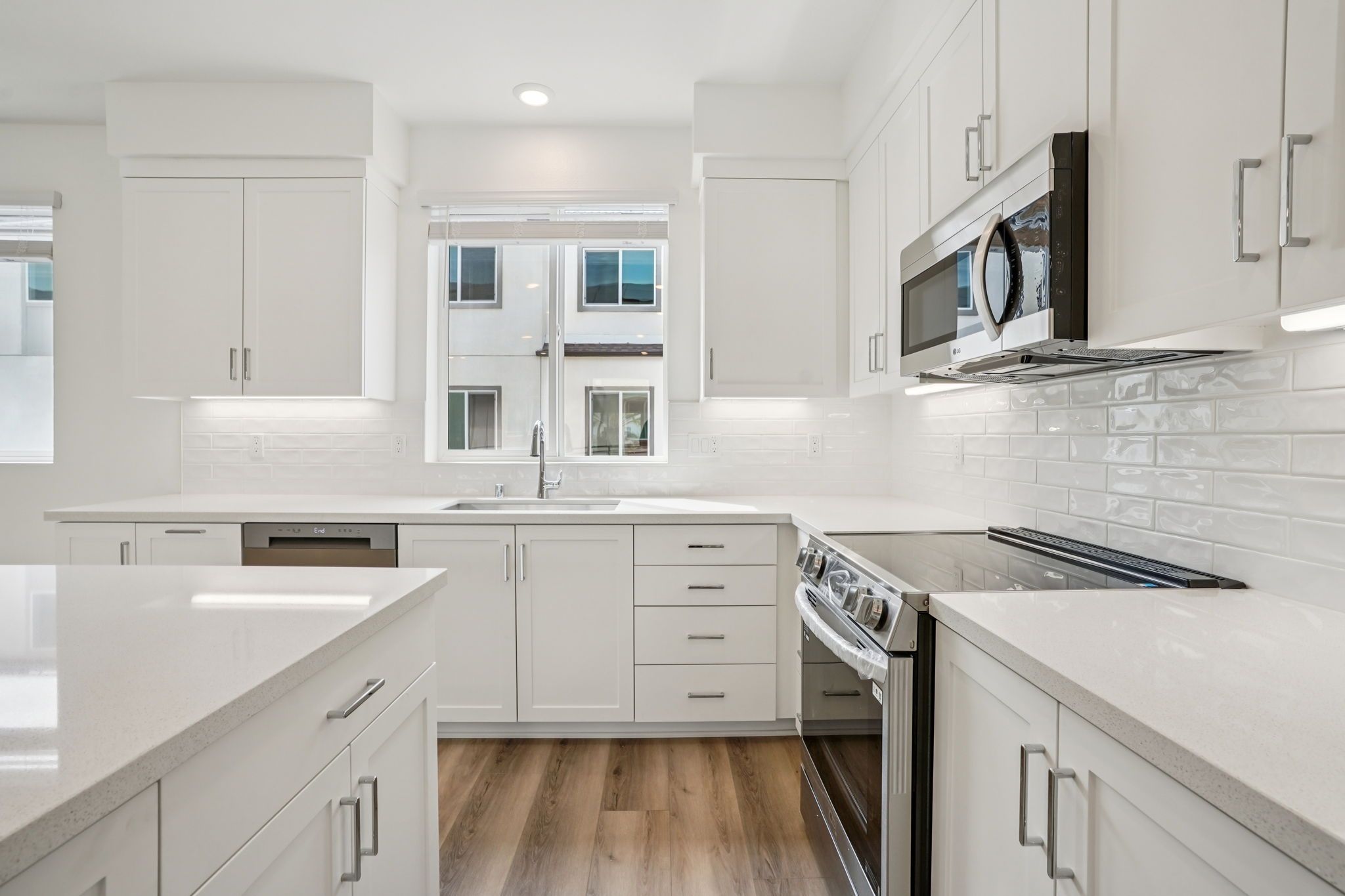 Kitchen:Spacious kitchen with undercabinet task lighting