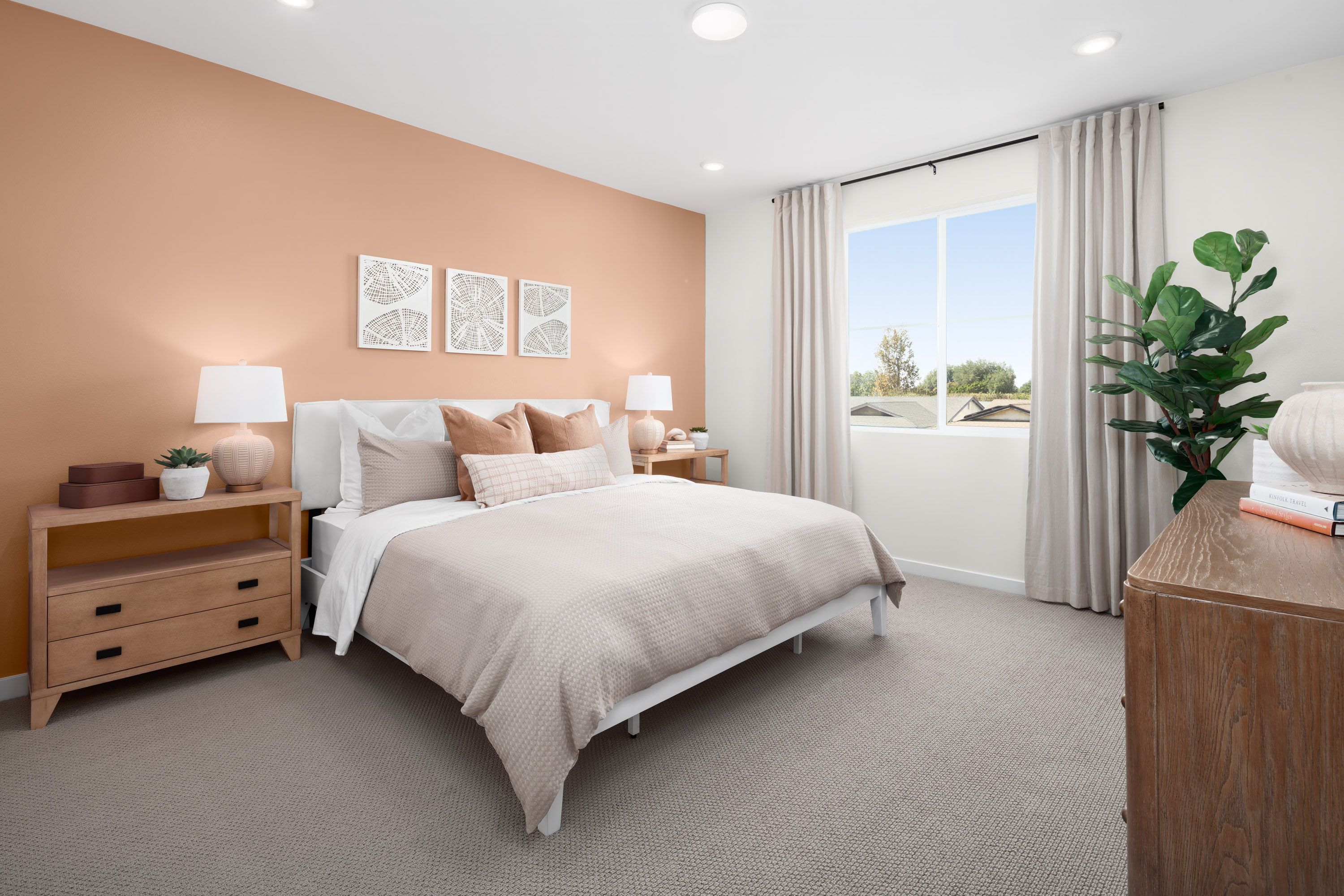 Plan 1 Model Home Primary Bedroom:Bright and spacious primary bedroom
