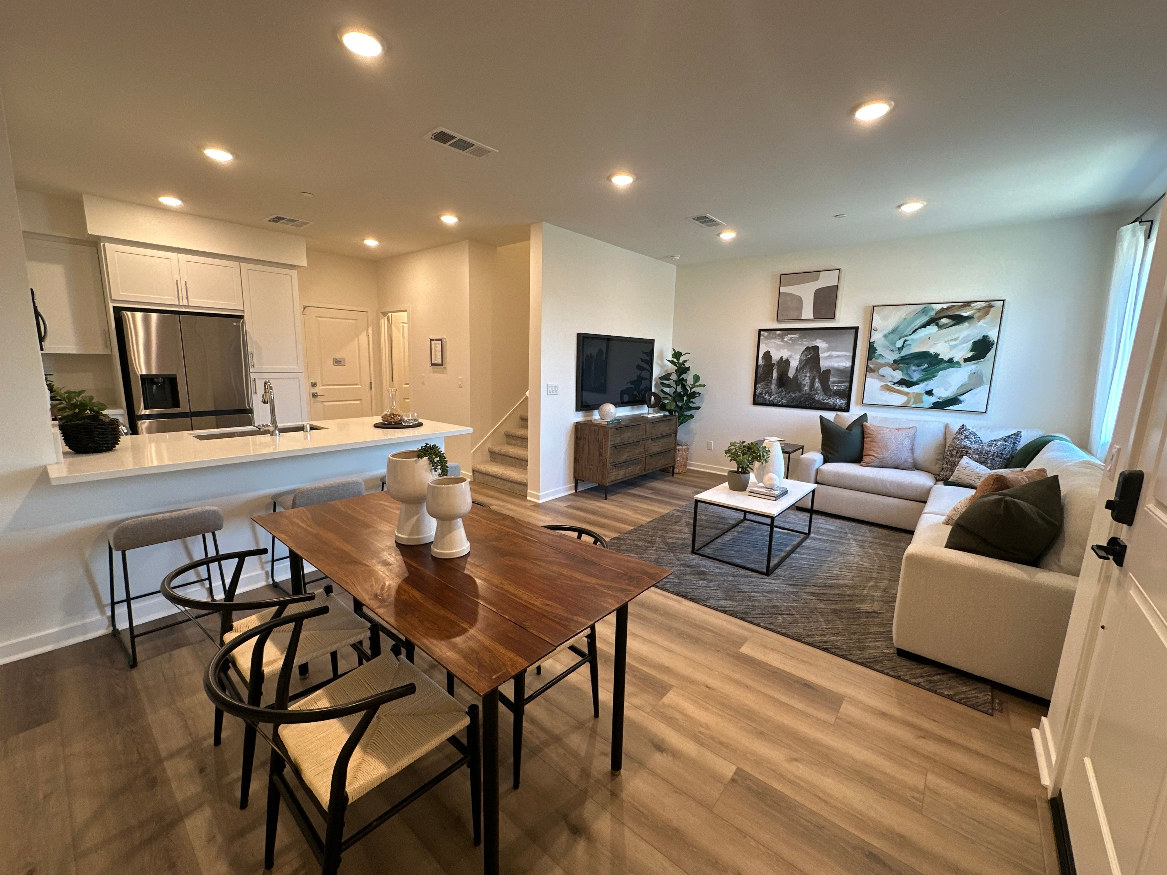 Plan 2 Model Home Decorated Great Room :Great Room with Living, Dining and Kitchen Area