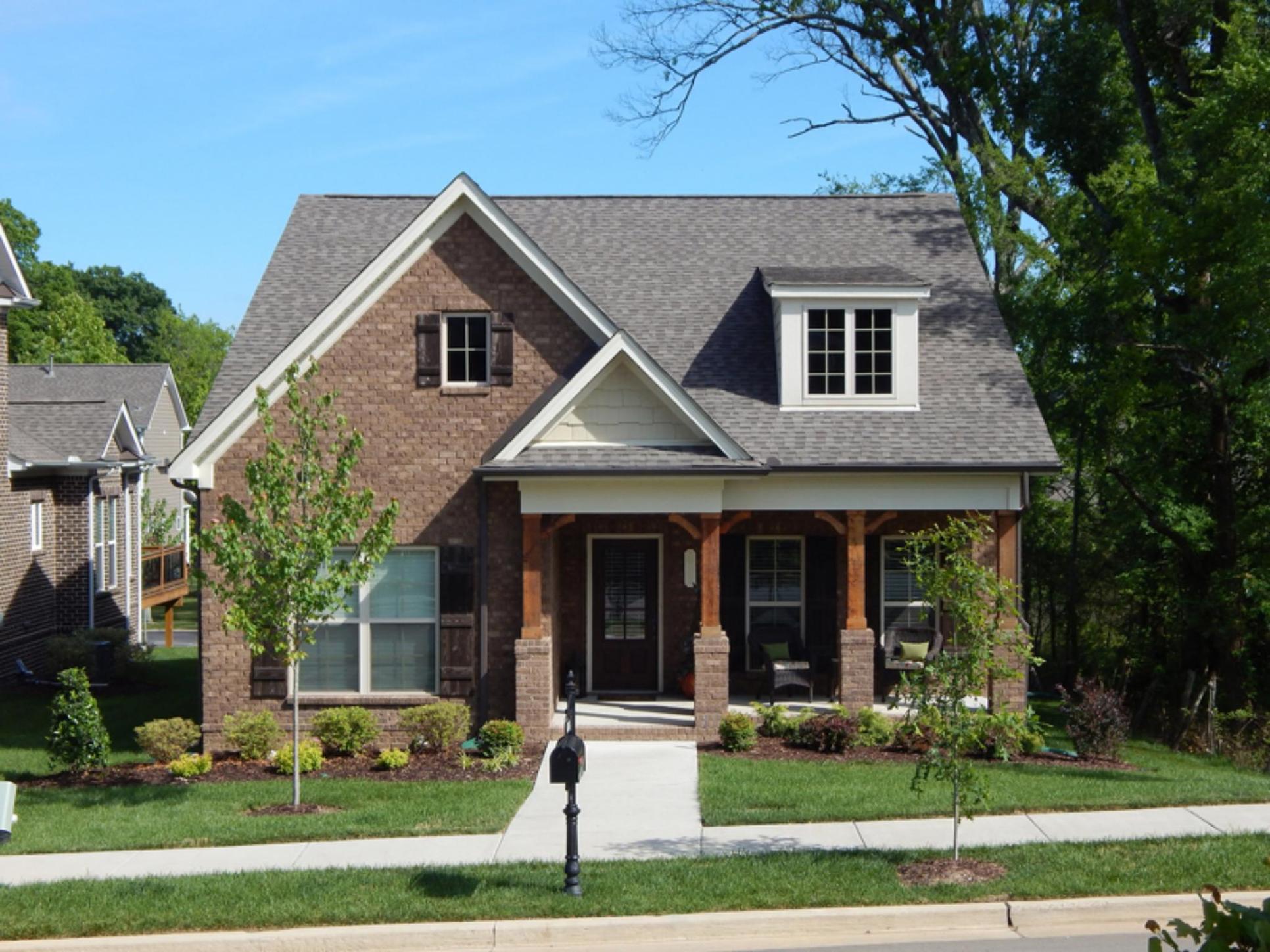 Holly Springs III cottage home brick dormer
