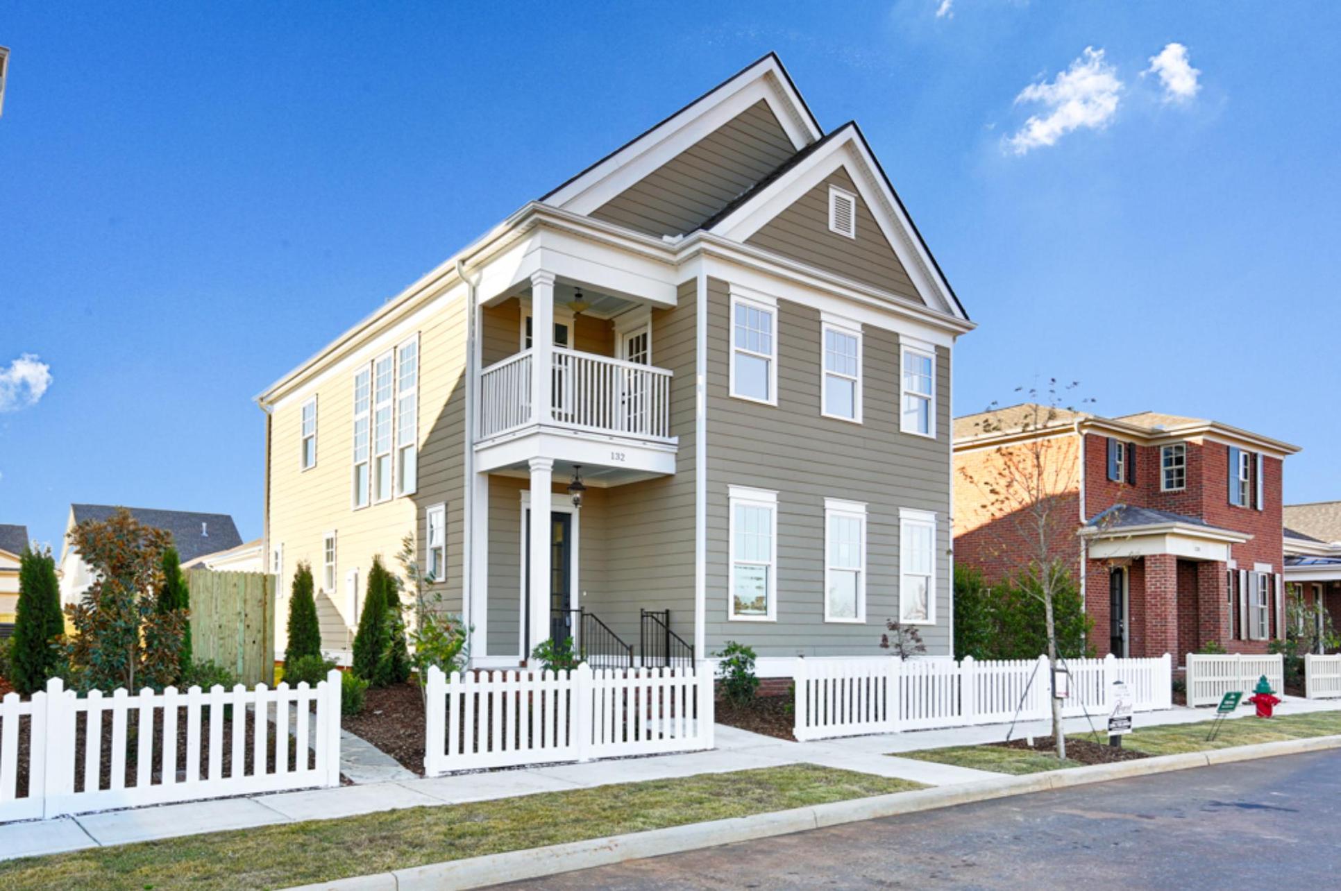 Vienna two level home exterior grey white trim balcony