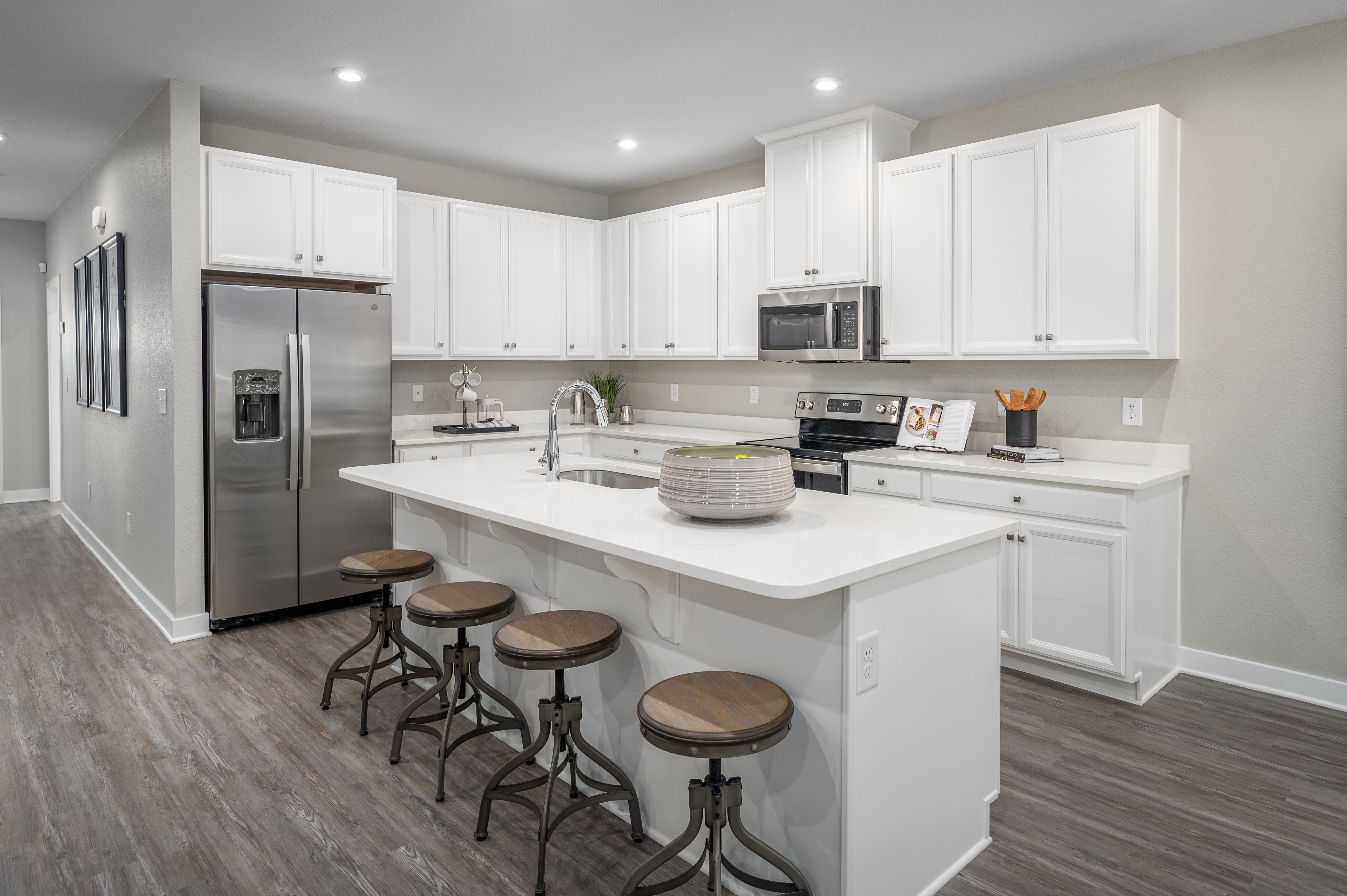 Lowest priced new townhome with a garage & lawn care included near top schools and Hwy 73.